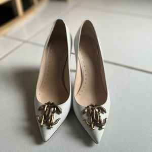 Roberto Cavalli White Leather Pumps with Gold Snake Buckle.